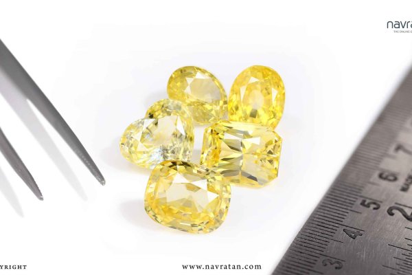 What month is dedicated to Yellow Sapphire (Pukhraj stone)