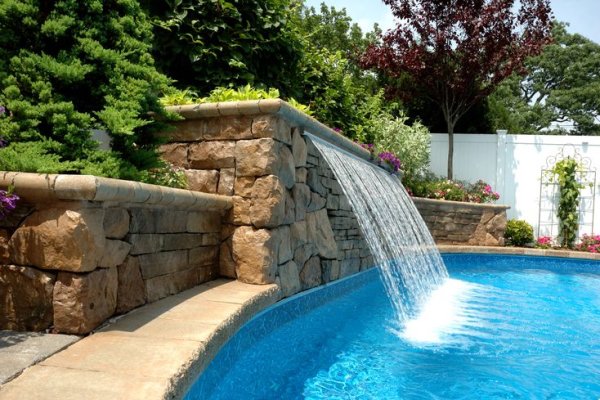 Incorporating Waterfalls and Fountains into Pool Design